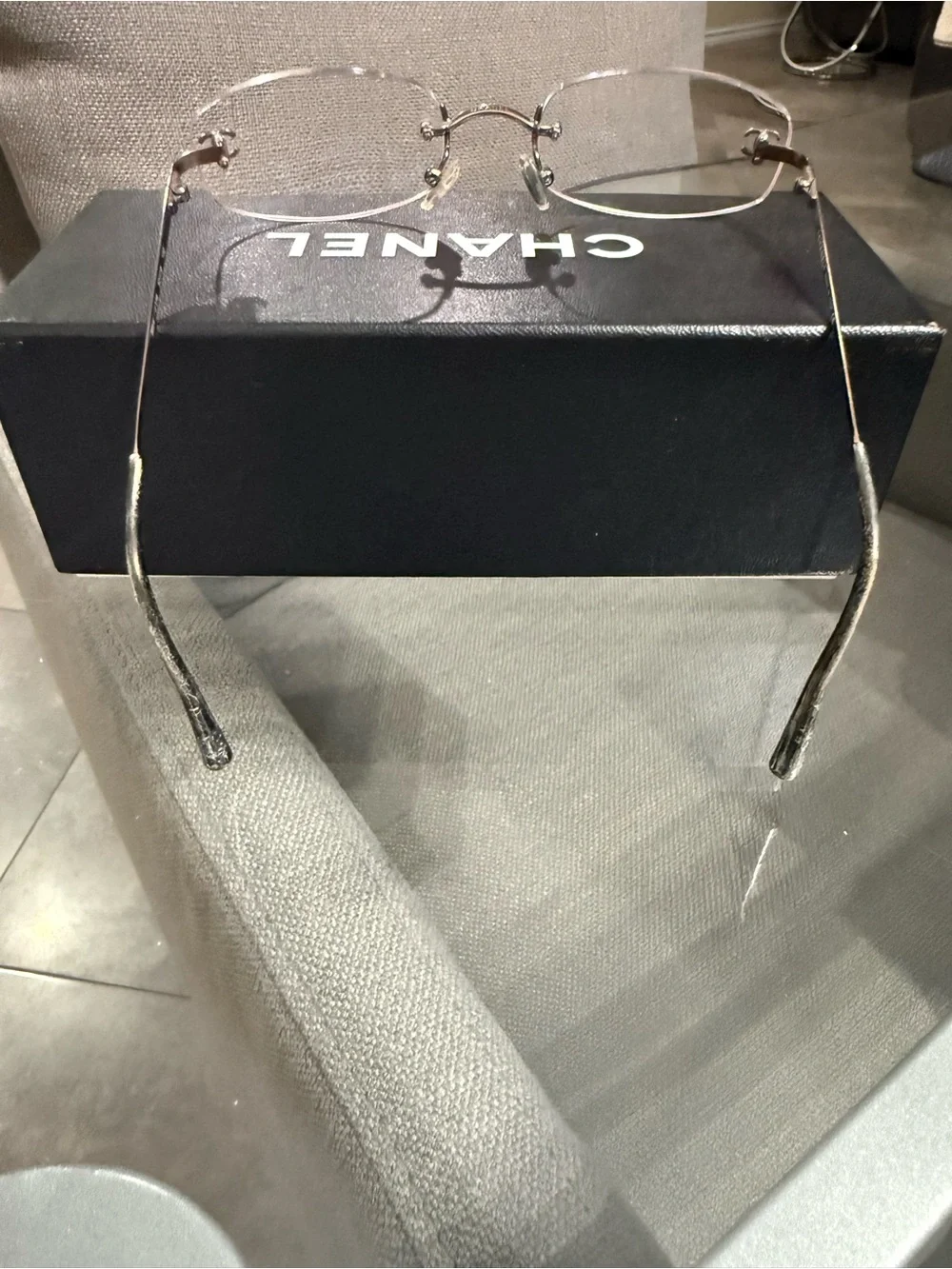 CHANEL Rimless Women's Glasses with bronze Accents